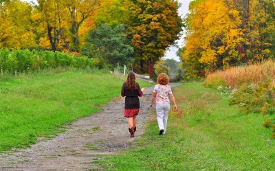 Katie and Deb walking in the fall