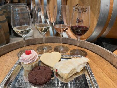 Photo of 4 dessert pairings with 4 glasses of wine in our barrel cellar.